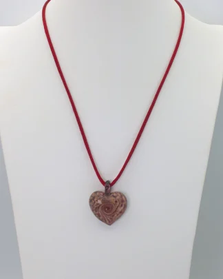 Murano glass red heart with copper infusion swirls on 18 inch red silk cord