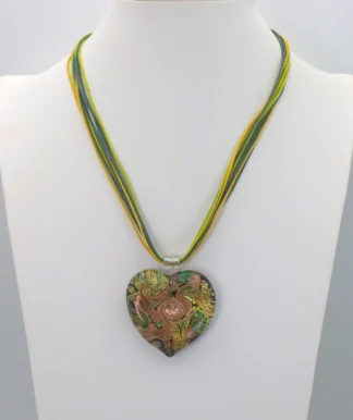 Murano glass green large heart necklace 1.5 inches wide, 2 inches long with copper and gold infusion, on a 15 inch multi strand cord with extender