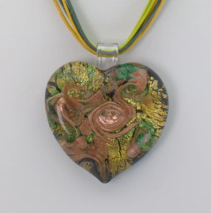 Murano glass green large heart necklace 1.5 inches wide, 2 inches long with copper and gold infusion, on a 15 inch multi strand cord with extender closeup