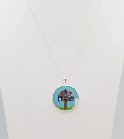 Colorful Millefiori Tree Pendant in Silver with blue background