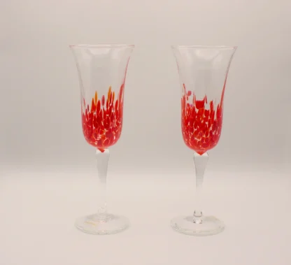 Murano glass champagne flutes with red detailing