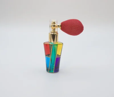 Curved Murano glass multicolor perfume bottle with red atomizer