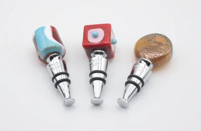 Three colorful Murano glass wine bottle stoppers