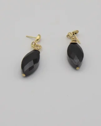 Murano black faceted drop earring with gold details. Shiny black drop earring on studs