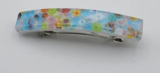 Blossoming Blue Barrette shows off shocking bright turquoise Murano glass with dainty millefiori pieces interspersed.  About 4 inches long with sturdy hardware for thick hair.