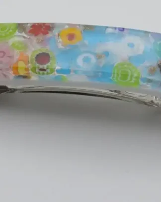 Blossoming Blue Barrette shows off shocking bright turquoise Murano glass with dainty millefiori pieces interspersed.  About 4 inches long with sturdy hardware for thick hair.