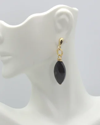 Murano black faceted drop earring with gold details. Shiny black drop earring on studs