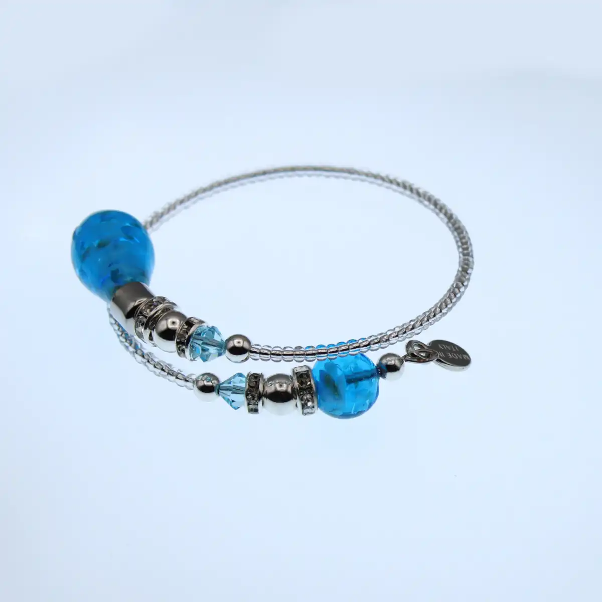 Wrap bracelet in silver seed beads with drop beads in Murano turquoise
