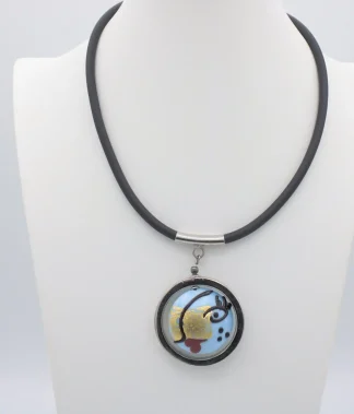 Blue Murano glass Miro style surreal lady face round pendant in a silver frame on a rubber cord with stainless steel bail