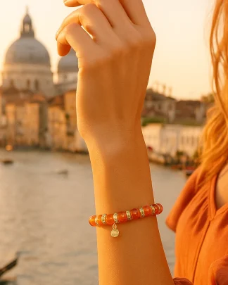 Orange Murano glass stretch bracelet with mini bling on model