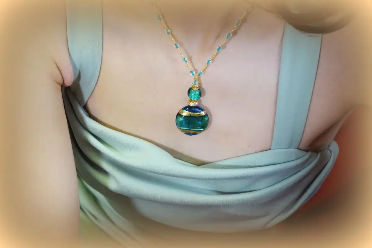 Aqua gold necklace on model