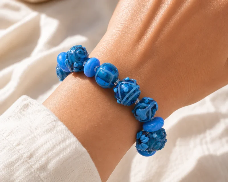 Stretch bracelet turquoise Murano glass hand made extra fancy beads with floral and other patterns on hand blown beads