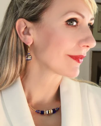 Sparkling cobalt and gold Murano glass necklace and earrings with mini bling details on model