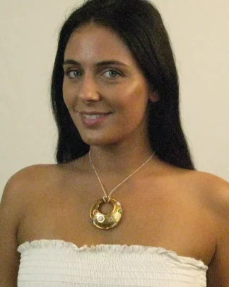 gold Murano glass circular pendant with scattered millefiori decoration on a seed bead cord